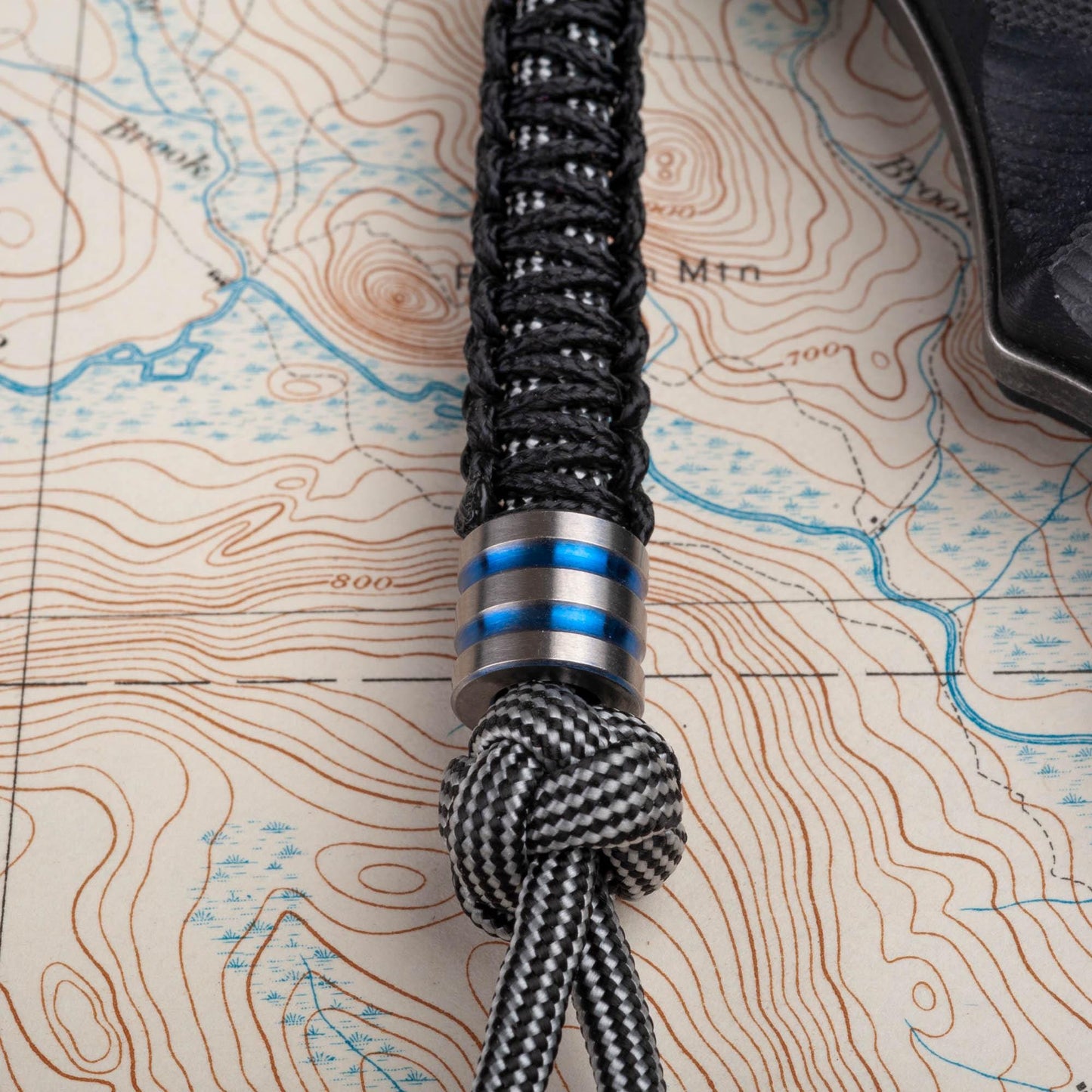 Mindbender Black and Silver Paracord Knife Lanyard With Titanium Bead
