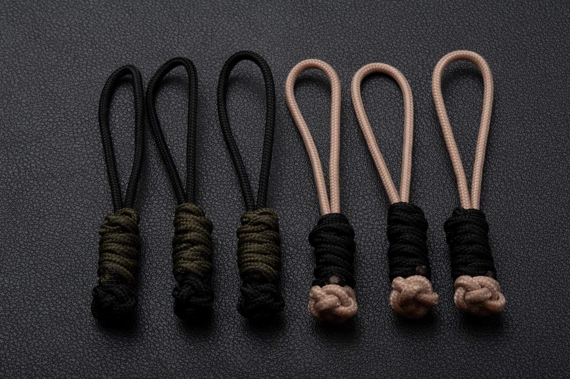 https://elesurvival.com/cdn/shop/products/extinction-level-event-two-color-275-paracord-zipper-pull-lanyards-3-pack-29977827901578.jpg?v=1663171924&width=1946